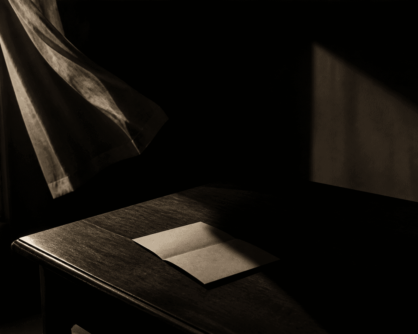 Film noir still rendered in deep chiaroscuro, a single hard-edged light source falling across a plain wooden table where a paper letter lies folded, half ill...